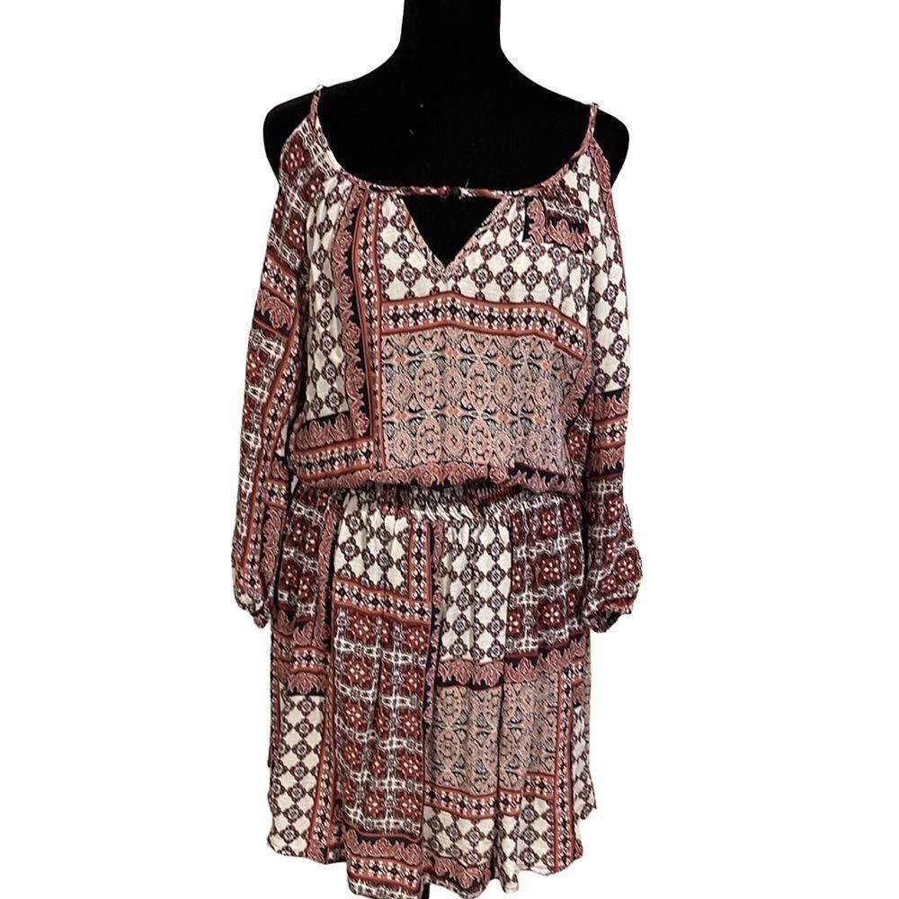 Multi Colored dress with elastic waist. Cut out shoulder. Super cute. Size Small